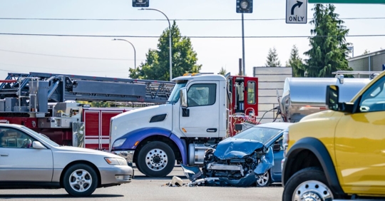 Truck and car accident at intersection